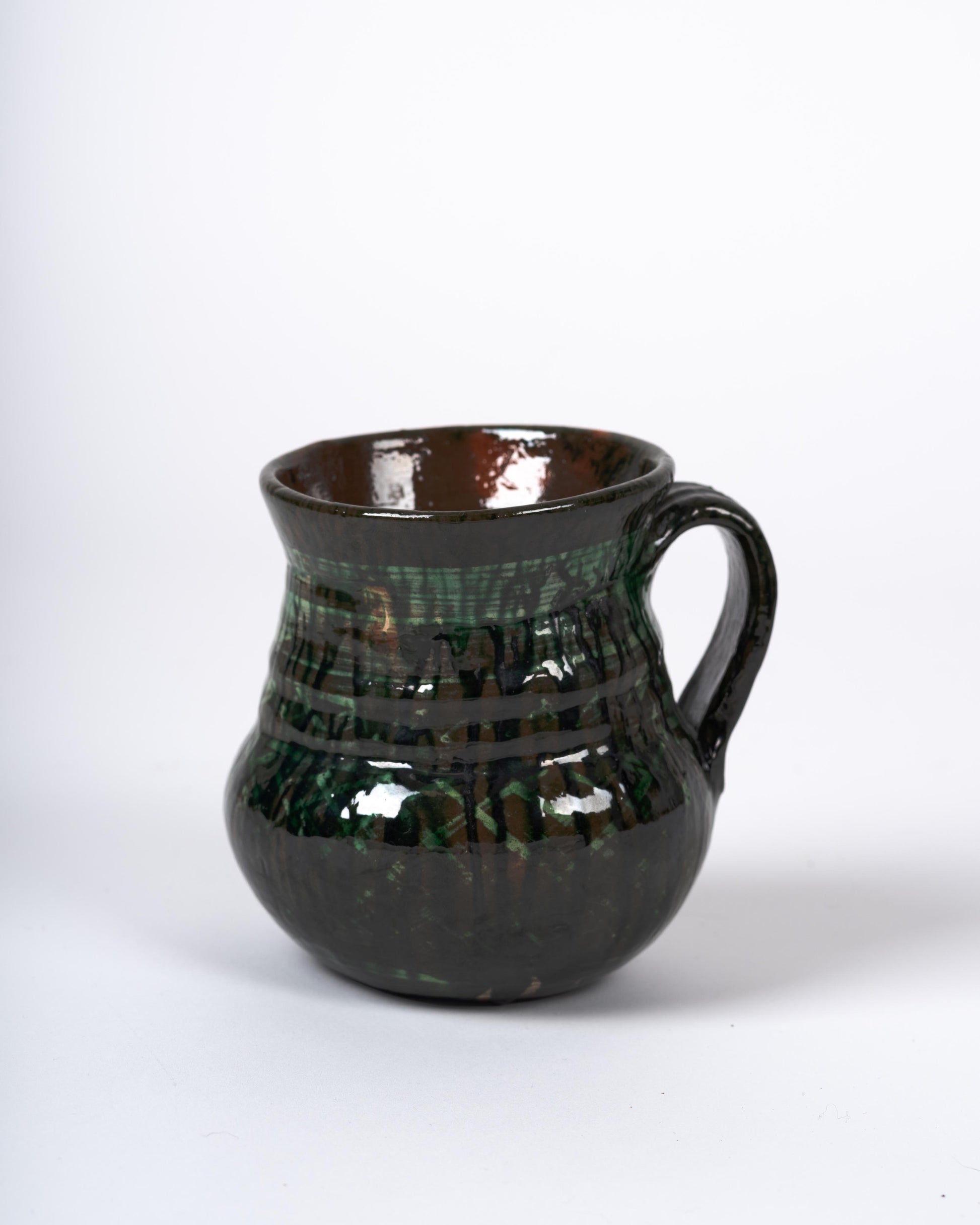 Green redware vessel from Michoacán, Mexico