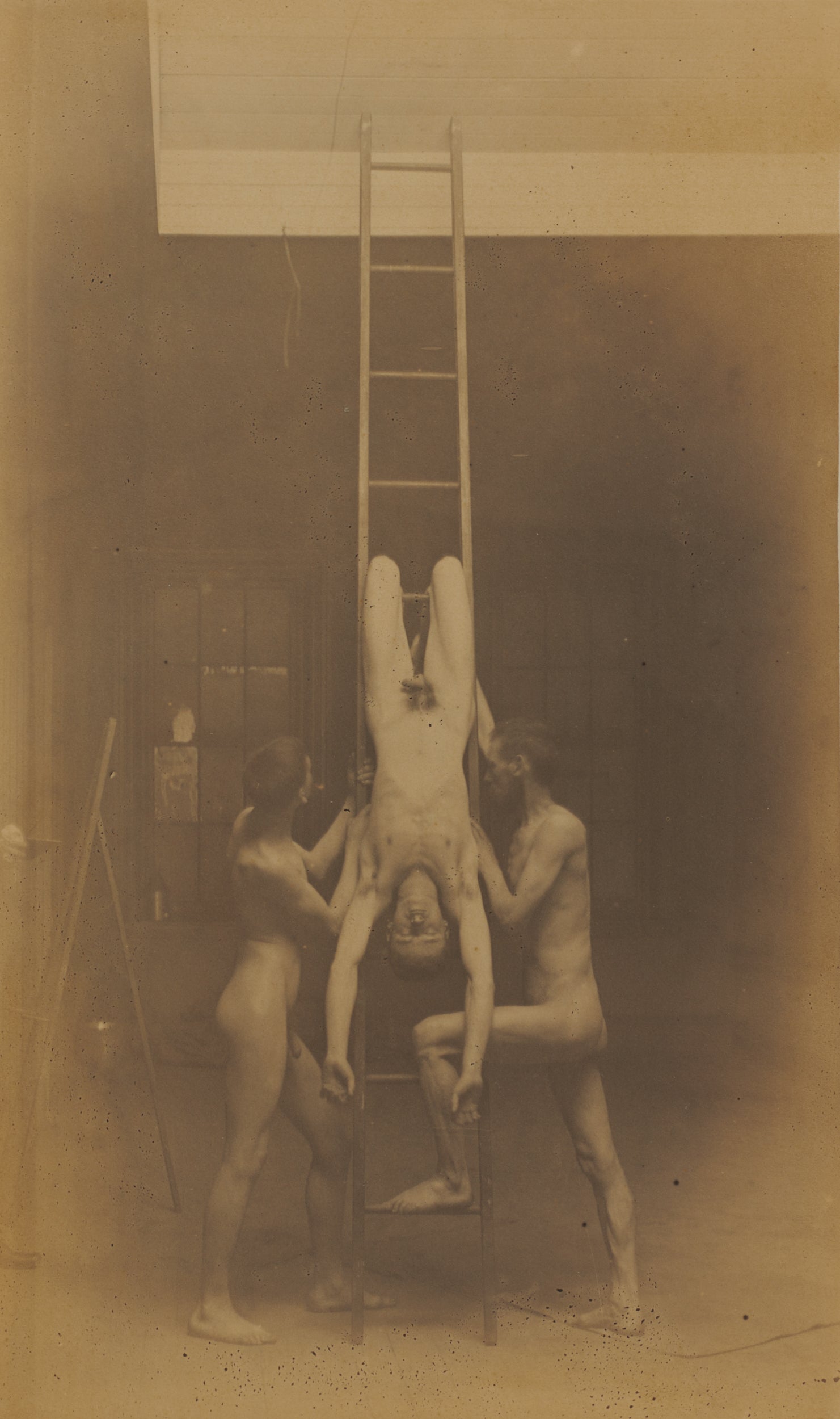 Three Male Nudes, One Hanging from Ladder, from The Grafly Album